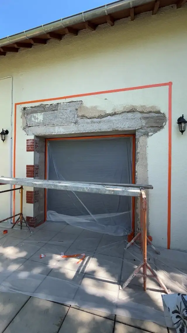 Reprise de linteau au-dessus d'une porte de garage en rénovation